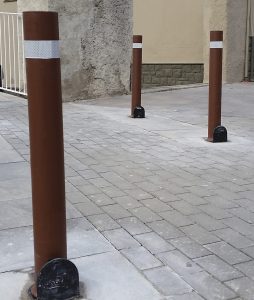 Custom-made brown A resist bollard installed