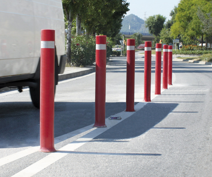 Red A-Flex flexible bollards installated to demarcate road